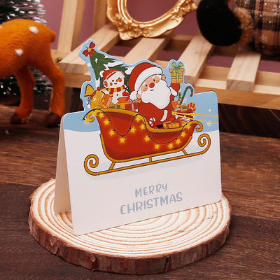 Un buon prezzo. Carta di auguri per Babbo Natale a tema creativo in linea
